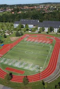 Multisport artificial turf field suitable for different sports disciplines